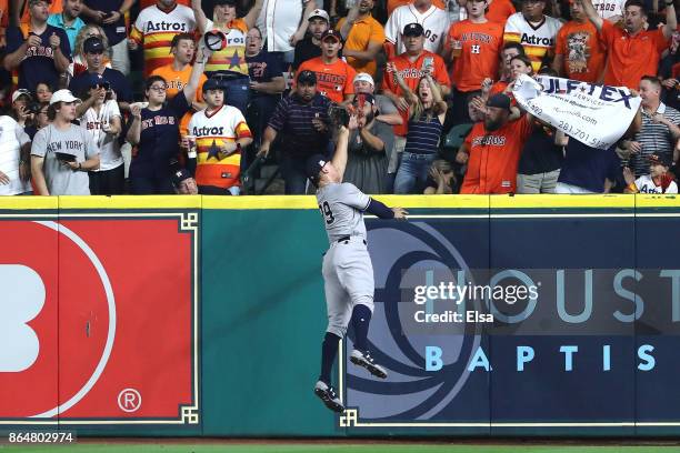 Aaron Judge of the New York Yankees catches a line drive in the outfield hit by Yuli Gurriel of the Houston Astros during the second inning in Game...