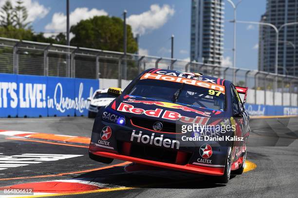 Shane Van Gisbergen drives the Red Bull Holden Racing Team Holden Commodore VF during qualifying for race 22 for the Gold Coast 600, which is part of...