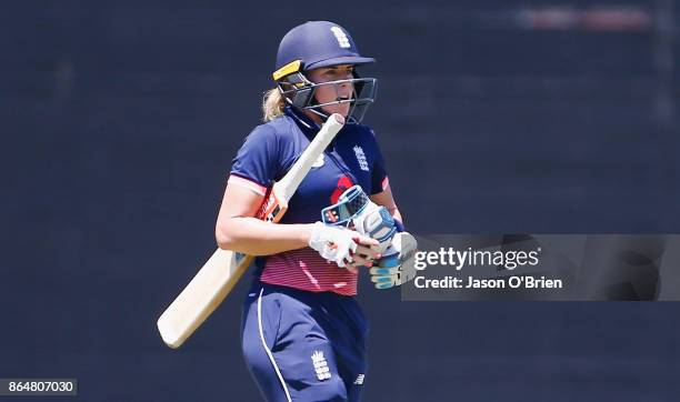 England's Lauren Winfield walks off after being dismissed during the Women's One Day International between Australia and England at Allan Border...