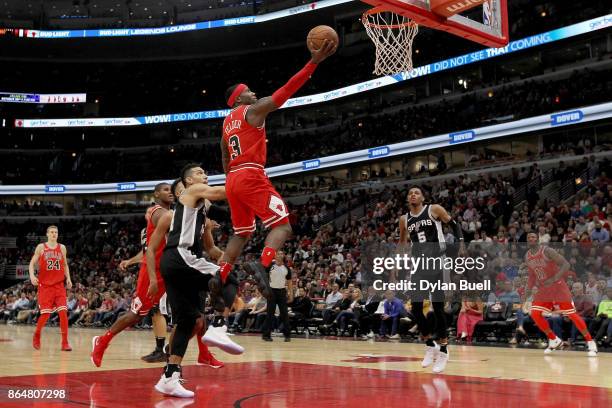 Kay Felder of the Chicago Bulls attempts a layup against the San Antonio Spurs in the second quarter at the United Center on October 21, 2017 in...