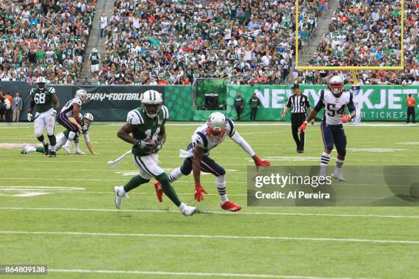 Wide Receiver Jeremy Kerley of the New York Jets scores a Touchdown in action against the New England Patriots during their game at MetLife Stadium...