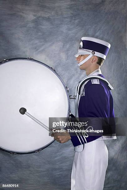 bass drum player in marching band - bombo fotografías e imágenes de stock