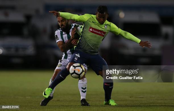 Maritimo midfielder Eber Bessa from Brazil with Vitoria Setubal midfielder Joao Costinha from Portugal in action during the Primeira Liga match...