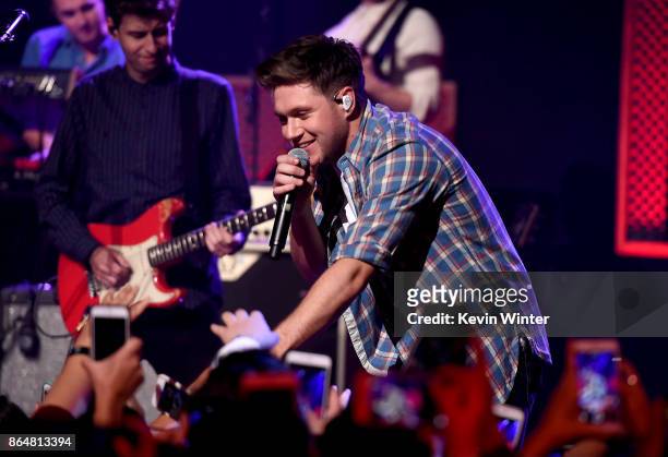 Singer/songwriter Niall Horan performs at the iHeartRadio Album Release Party With Niall Horan at iHeartRadio Theater on October 20, 2017 in Burbank,...