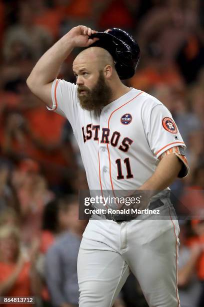 Evan Gattis of the Houston Astros celebrates after hitting a a solo home run against CC Sabathia of the New York Yankees during the fourth inning in...