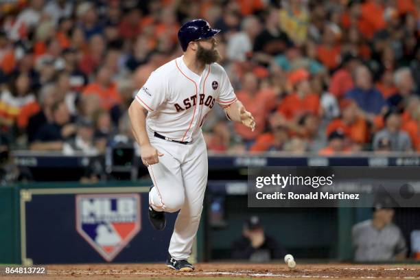 Evan Gattis of the Houston Astros celebrates after hitting a a solo home run against CC Sabathia of the New York Yankees during the fourth inning in...