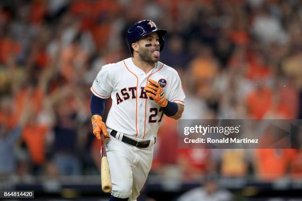 Jose Altuve of the Houston Astros celebrates after hitting a solo home run against Tommy Kahnle of the New York Yankees during the fifth inning in...