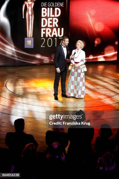 Kai Pflaume and winner Bettina Landgrafe during the 'Goldene Bild der Frau' award at Hamburg Cruise Center on October 21, 2017 in Hamburg, Germany.