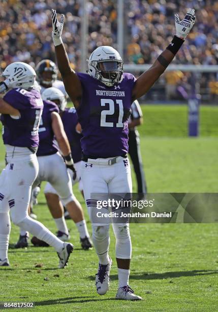 Kyle Queiro of the Northwestern Wildcats celebrates after Northwestern defeated Iowa at Ryan Field on October 21, 2017 in Evanston, Illinois....