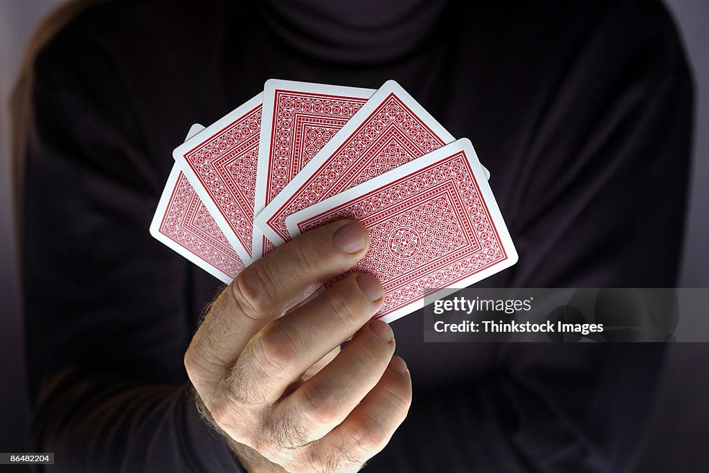 Hand Holding Playing Cards High-Res Stock Photo - Getty Images