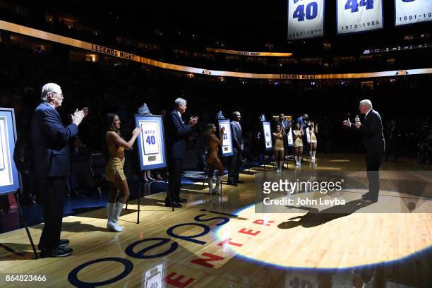 Denver Nuggets former player and coach Dan Issel addresses the crowd during halftime of the game between the Nuggets and the Sacramento Kings game on...