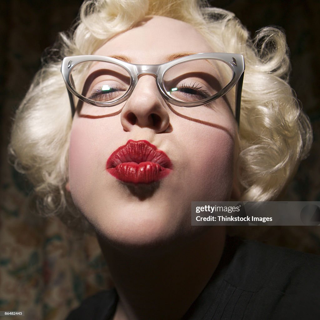 Woman puckering lips