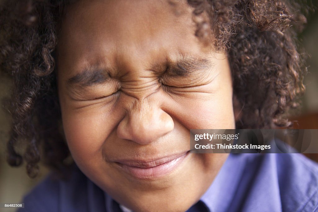 Close-up head shot of pre-teen boy