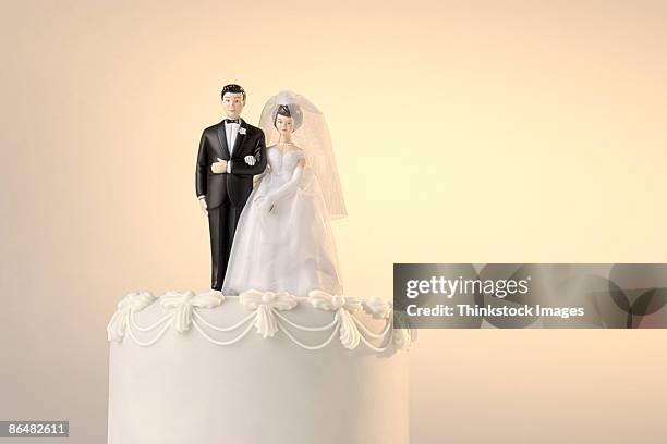 wedding cake topper - wedding cake figurine stock pictures, royalty-free photos & images