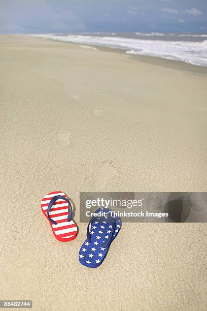 sandals on beach - american flag beach stock pictures, royalty-free photos & images