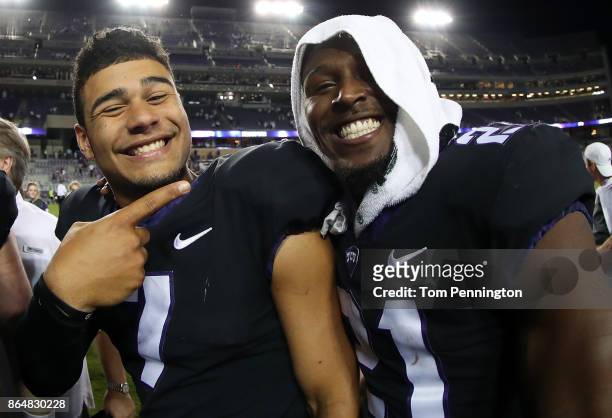 Kenny Hill of the TCU Horned Frogs celebrates with Kyle Hicks of the TCU Horned Frogs after the TCU Horned Frogs beat the Kansas Jayhawks 43-0 at...