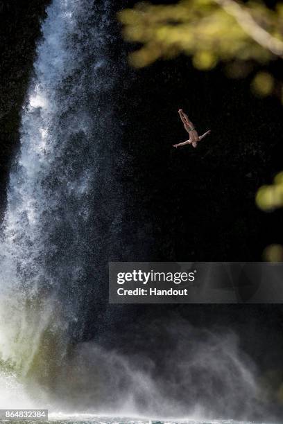 In this handout image provided by Red Bull, Kris Kolanus of Poland dives from the 27 metre platform during the sixth and final stop of the Red Bull...