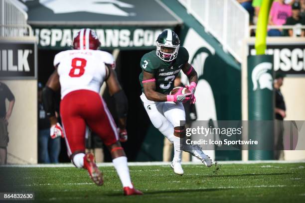 Spartans running back L.J. Scott runs up field during a Big Ten Conference NCAA football game between Michigan State and Indiana on October 21 at...
