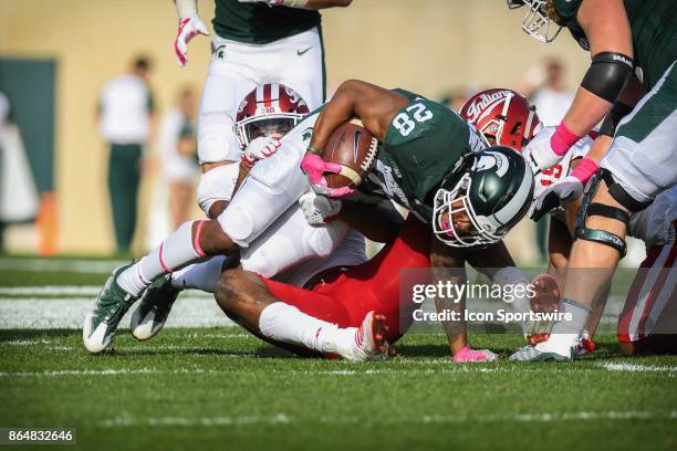 Spartans running back Madre London fights for extra yardage during a Big Ten Conference NCAA football game between Michigan State and Indiana on...