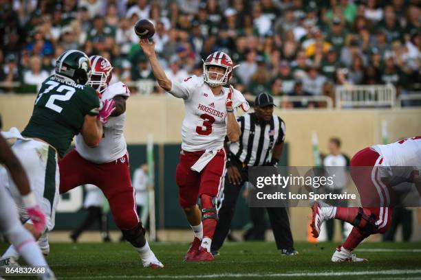 Hoosiers quarterback Peyton Ramsey fires a pass during a Big Ten Conference NCAA football game between Michigan State and Indiana on October 21 at...