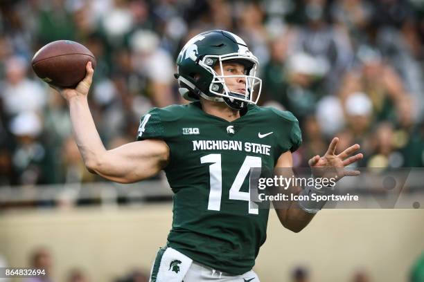 Spartans quarterback Brian Lewerke drops back to pass during a Big Ten Conference NCAA football game between Michigan State and Indiana on October 21...