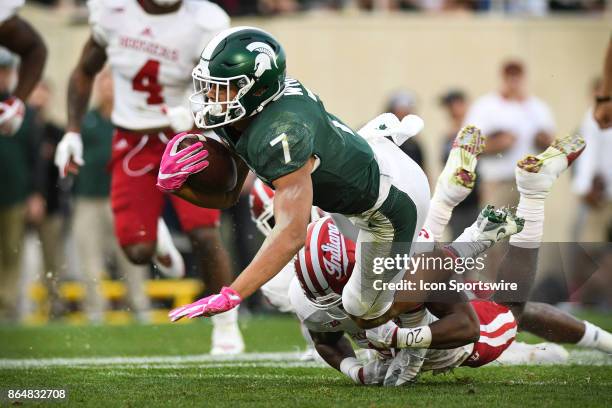 Spartans wide receiver Cody White gets tackled from behind during a Big Ten Conference NCAA football game between Michigan State and Indiana on...