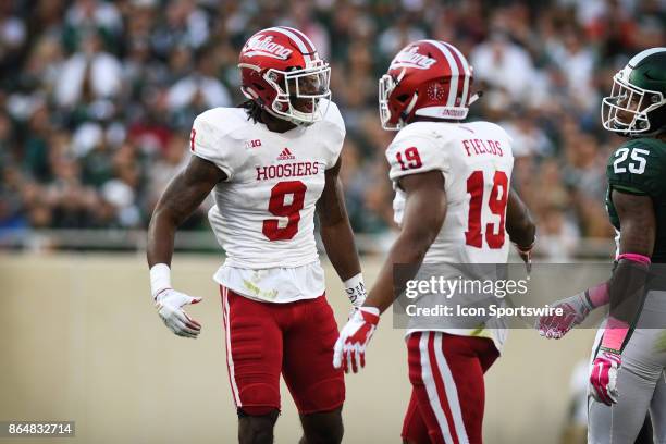 Hoosiers safety Jonathan Crawford and defensive back Tony Fields celebrate an important defensive stop during a Big Ten Conference NCAA football game...