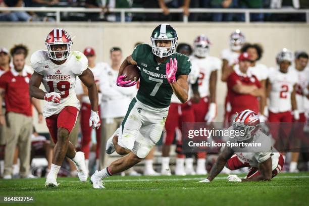 Spartans wide receiver Cody White picks up a big gain during a Big Ten Conference NCAA football game between Michigan State and Indiana on October 21...