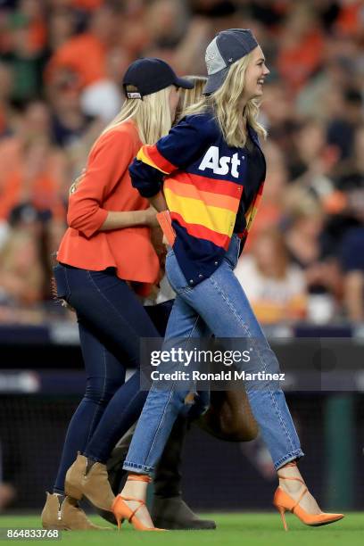 Model Kate Upton celebrates after the Houston Astros defeated the New York Yankees by a score of 4-0 to win Game Seven of the American League...