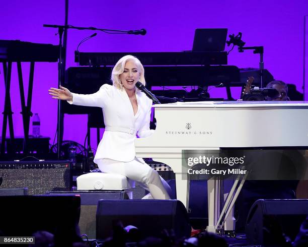 Lady Gaga performs in concert as a surprise guest during the "Deep From The Heart: One America Appeal Concert" at Reed Arena on October 21, 2017 in...