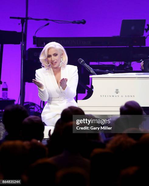 Lady Gaga performs in concert as a surprise guest during the "Deep From The Heart: One America Appeal Concert" at Reed Arena on October 21, 2017 in...