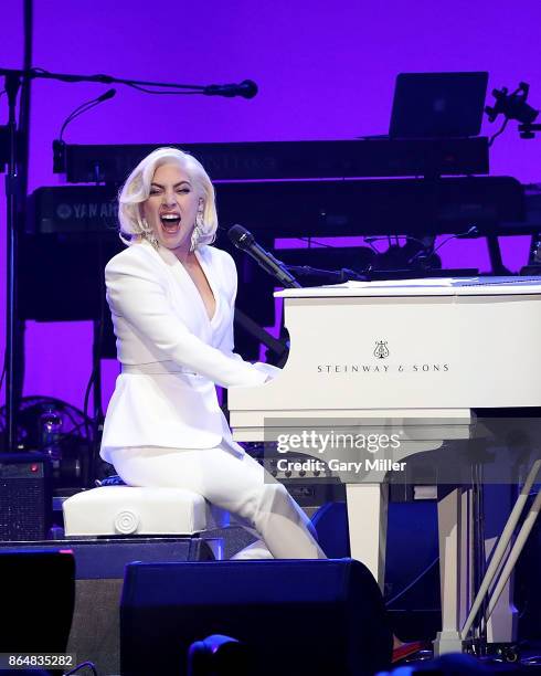 Lady Gaga performs in concert as a surprise guest during the "Deep From The Heart: One America Appeal Concert" at Reed Arena on October 21, 2017 in...