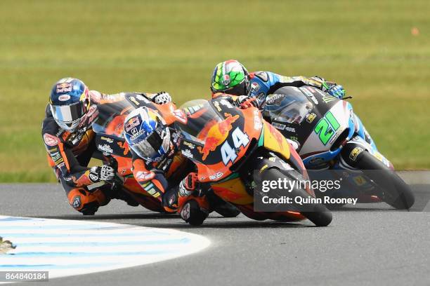 Miguel Oliveira of Portugal and the Red Bull KTM AJO leads Franco Morbidelli of Italy and the EG 0,0 Marc VDS and Brad Binder of South Africa and the...
