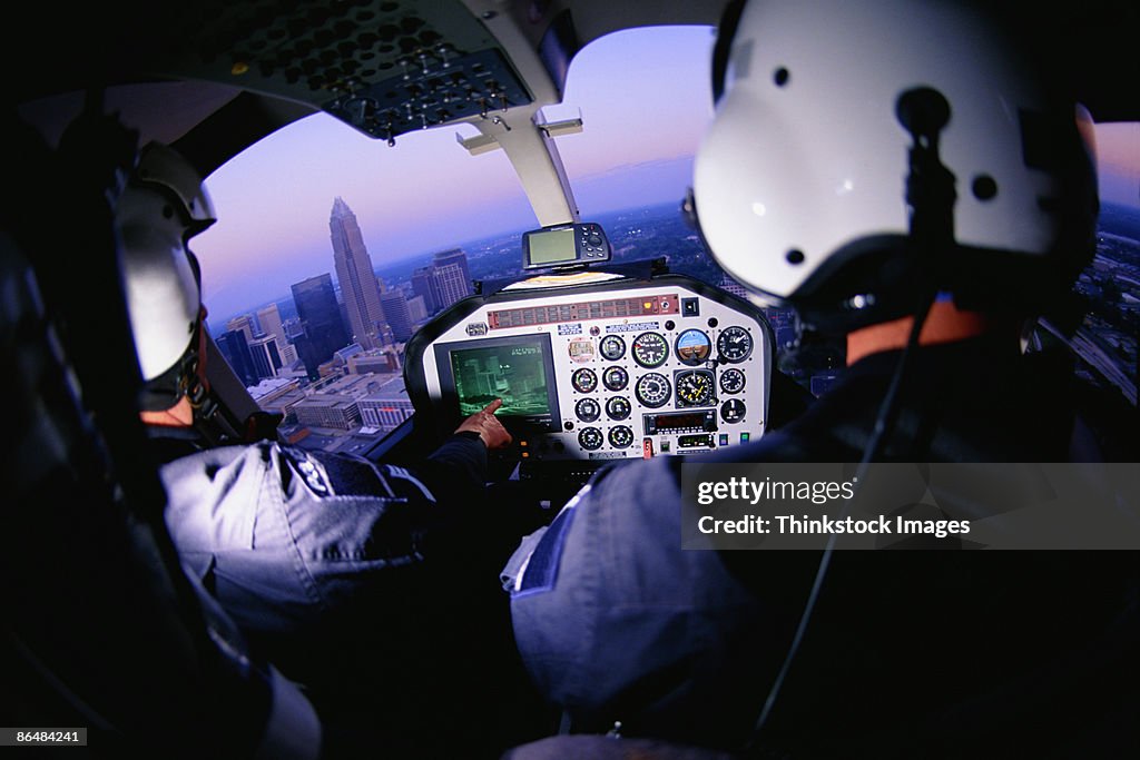 Two pilots flying helicopter