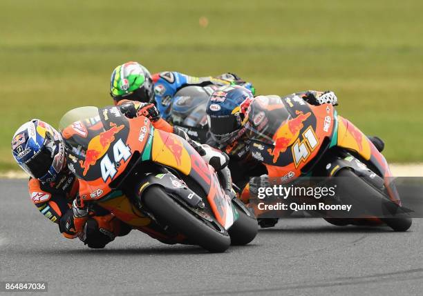 Miguel Oliveira of Portugal and the Red Bull KTM AJO leads Franco Morbidelli of Italy and the EG 0,0 Marc VDS and Brad Binder of South Africa and the...