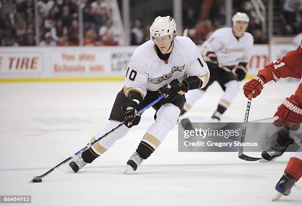 Corey Perry of the Anaheim Ducks skates with the puck against the Detroit Red Wings during Game One of the Western Conference Semifinals of the 2009...