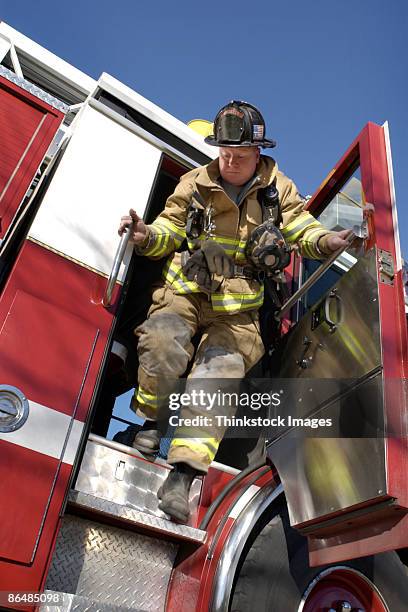 Getting Off A Fire Engine 236 Fire Truck Door Stock Photos, High-Res Pictures, and Images - Getty ...