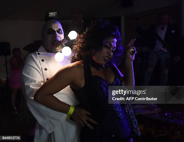 Charlie "Uncle" Fester performs during the tryouts for the queen of the Pasadena's famous Doo-Dah Parade in Pasadena, California on October 21, 2017....