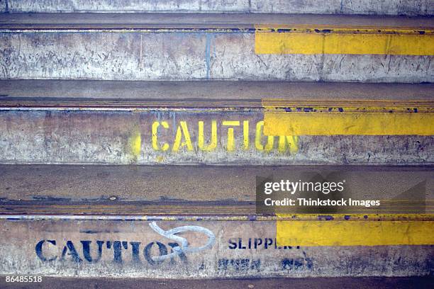 steps with caution painted on them - slippery road stock pictures, royalty-free photos & images