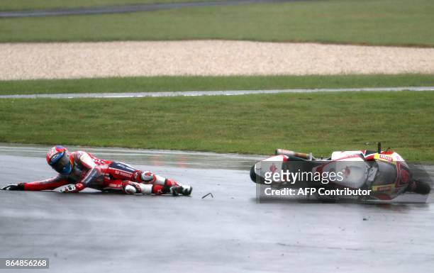 Federal Oil Gresini Kalex rider Jorge Navarro of Spain crashes during the warm session of the Moto2-class Grand Prix of the Australian MotoGP Grand...
