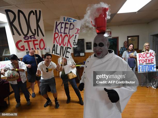 Charlie "Uncle" Fester performs during the tryouts for the queen of the Pasadena's famous Doo-Dah Parade in Pasadena, California on October 21, 2017....