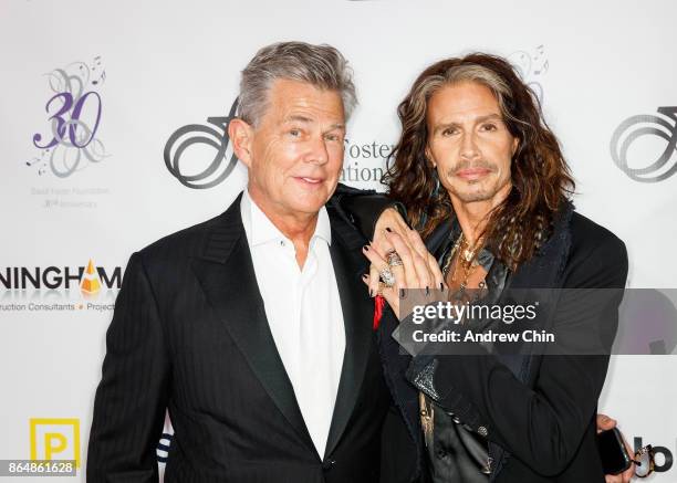 David Foster and Steven Tyler attend the David Foster Foundation Gala at Rogers Arena on October 21, 2017 in Vancouver, Canada.