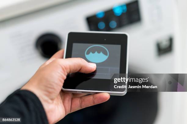 digital device for washing machine touch screen for smart home functions - gesture control screen stockfoto's en -beelden