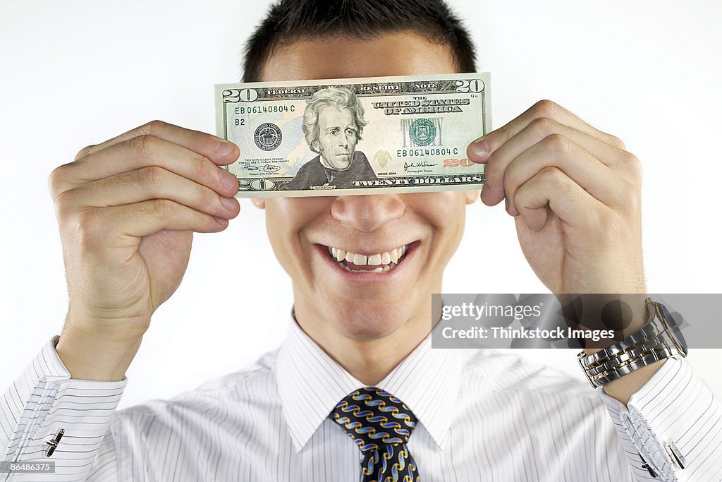 Businessman holding money