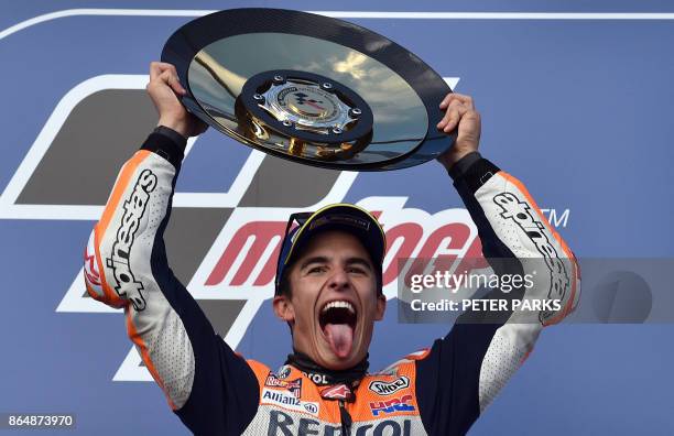 Honda rider Marc Marquez of Spain celebrates his victory on the podium at the end of the Australian MotoGP Grand Prix at Phillip Island on October...