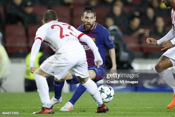 Leonardo Koutris of Olympiacos, Lionel Messi of FC Barcelona during the UEFA Champions League group D match between FC Barcelona and Olympiacos on...