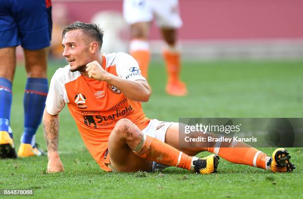 Eric Bautheac of the Roar celebrates scoring a goal during the round three A-League match between the Brisbane Bullets and the Newcastle Jets at...