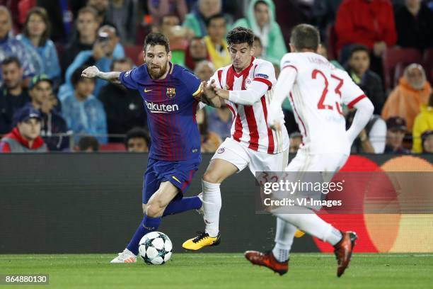 Lionel Messi of FC Barcelona, Thanasis Androutsos of Olympiacos, Leonardo Koutris of Olympiacos during the UEFA Champions League group D match...