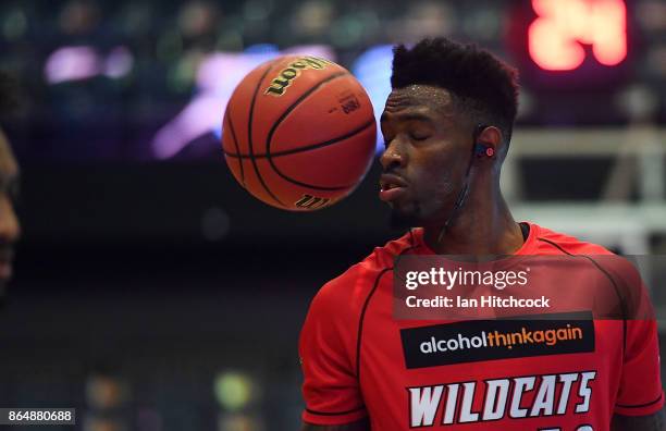 Derek Cooke Jr of the Wildcats warms up before the start of the round three NBL match between the Cairns Taipans and the Perth Wildcats at Cairns...