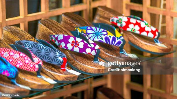 traditional wooden slippers or geta on sale - destination fashion 2016 stock-fotos und bilder